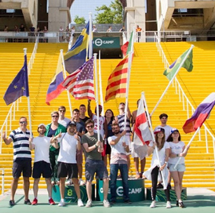 Students with flags at Olympic Stadium
